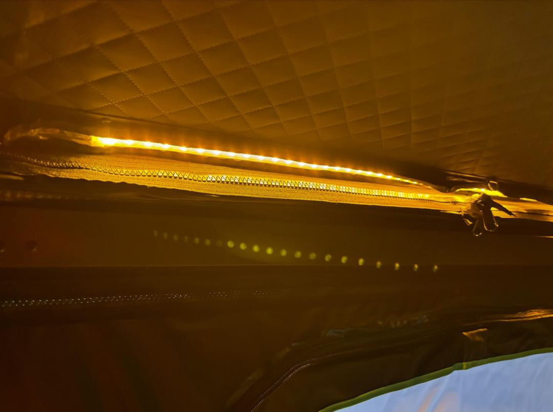 Interior LED lighting in the NEW Deluxe Z Tent shows superior design quality for spacious rooftop camping.